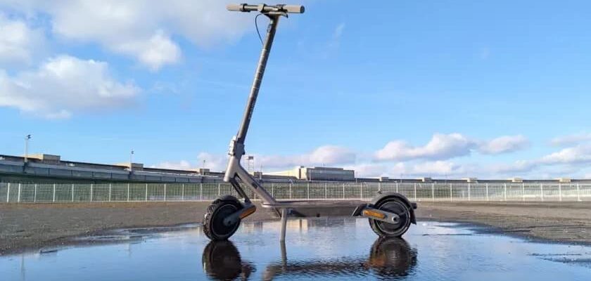 xiaomi electric scooter 4 ultra standing in a puddle
